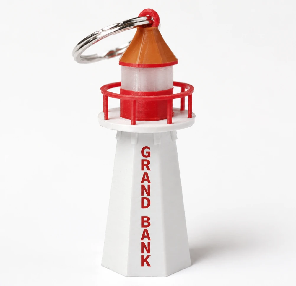 Red and white 3D printed Grand Bank Lighthouse Keychain with metal key ring